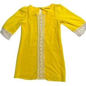 Girls, yellow polyester dress with white lace size 10